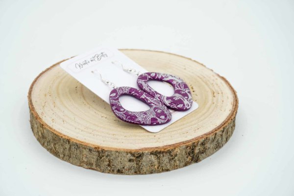 ohrringe fimo polymerton epoyidharz resin rotviolett mit gesichtern
